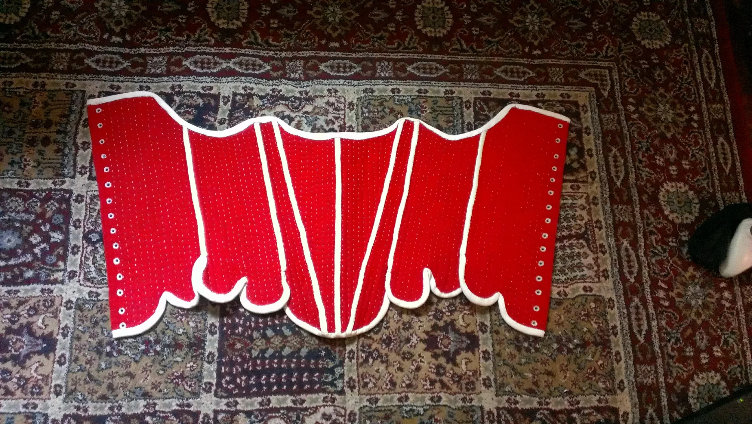 Wool covered, leather bound 18th Century reproduction stays.