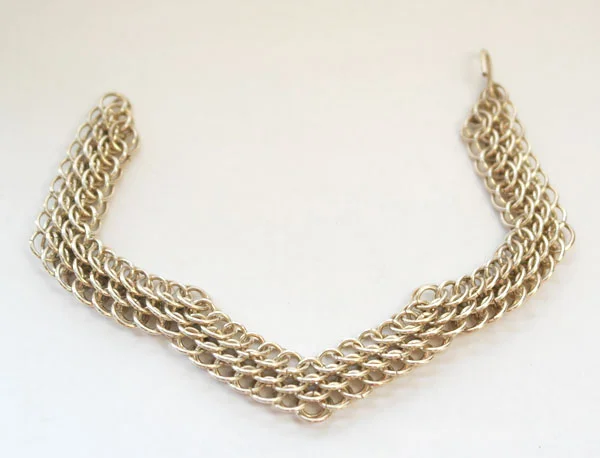 I don't do much chainmail anymore but pictured below is a sterling silver dragonscale bracelet