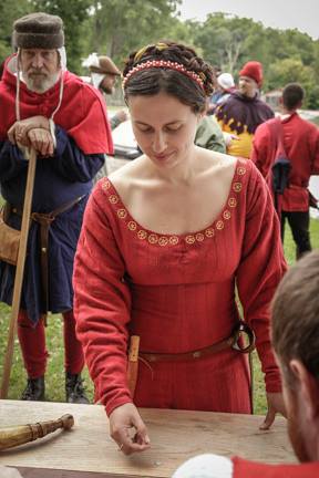 Me in a completely hand sewed medieval gown with embroidered accents.