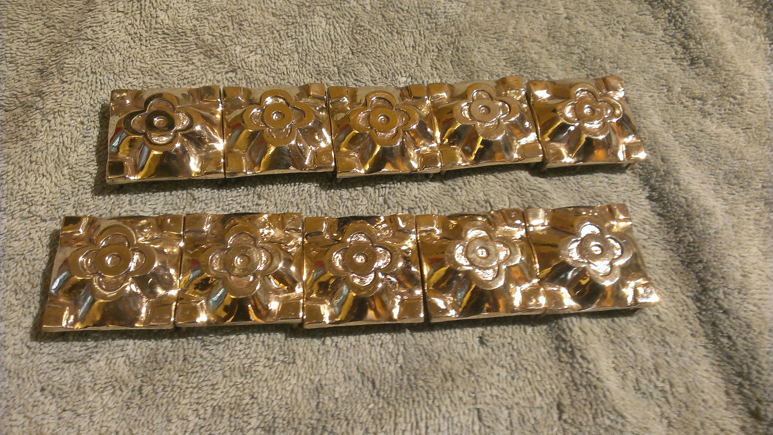 Belt plaques getting ready for mounting. 