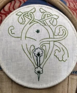 A piece of embroidery inspired by a medieval bestiary, linen and crewel wool. 