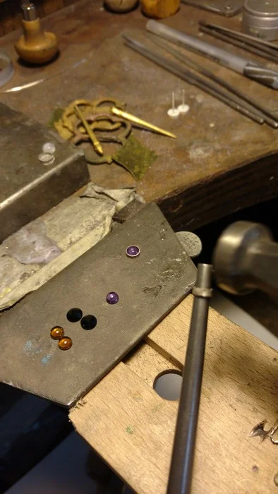 Hammering them to shape