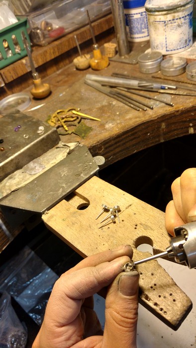 Using a diamond burr to clean out the inside. 