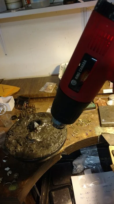 I use a heat gun to soften pitch 