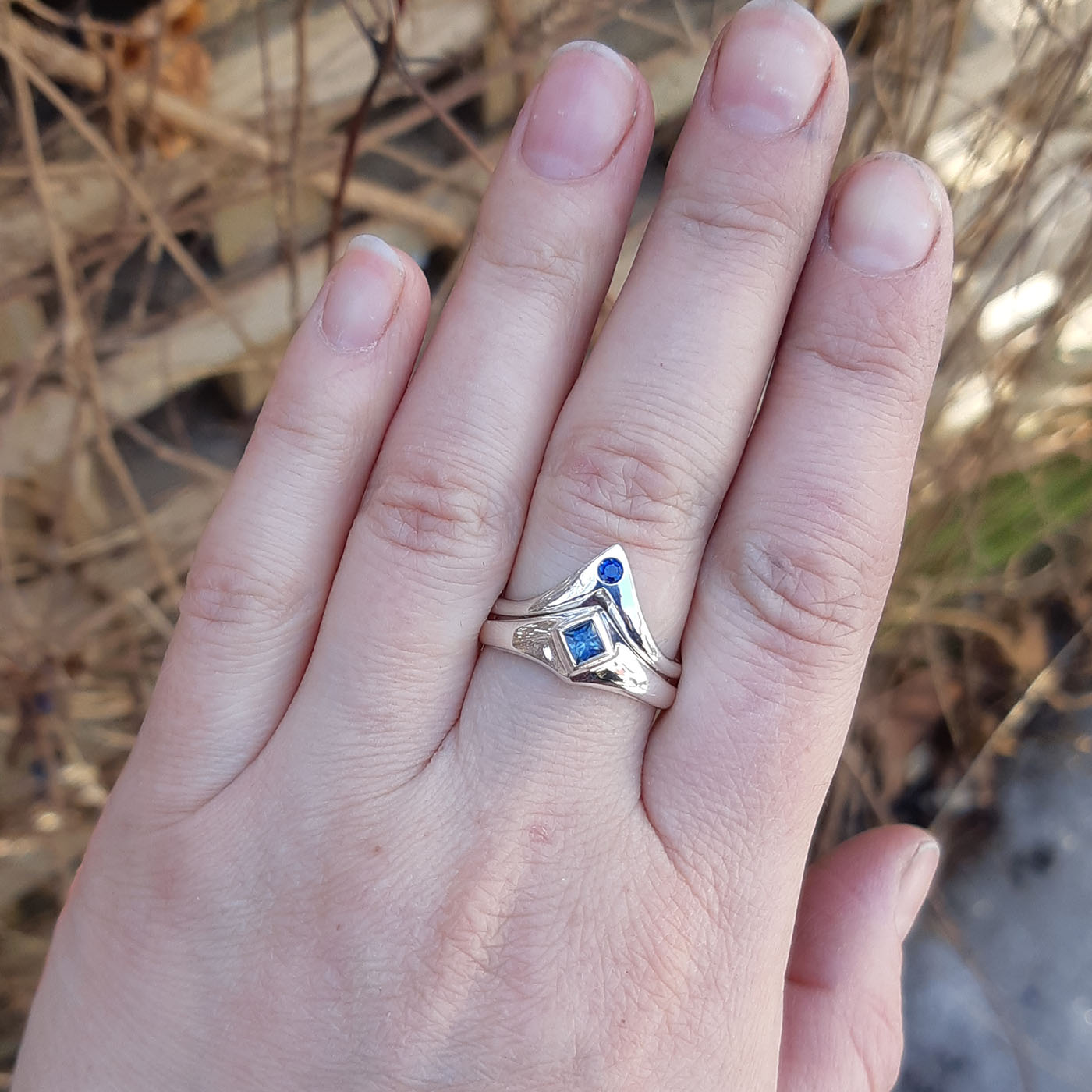 sapphrie ring stack hand.jpg