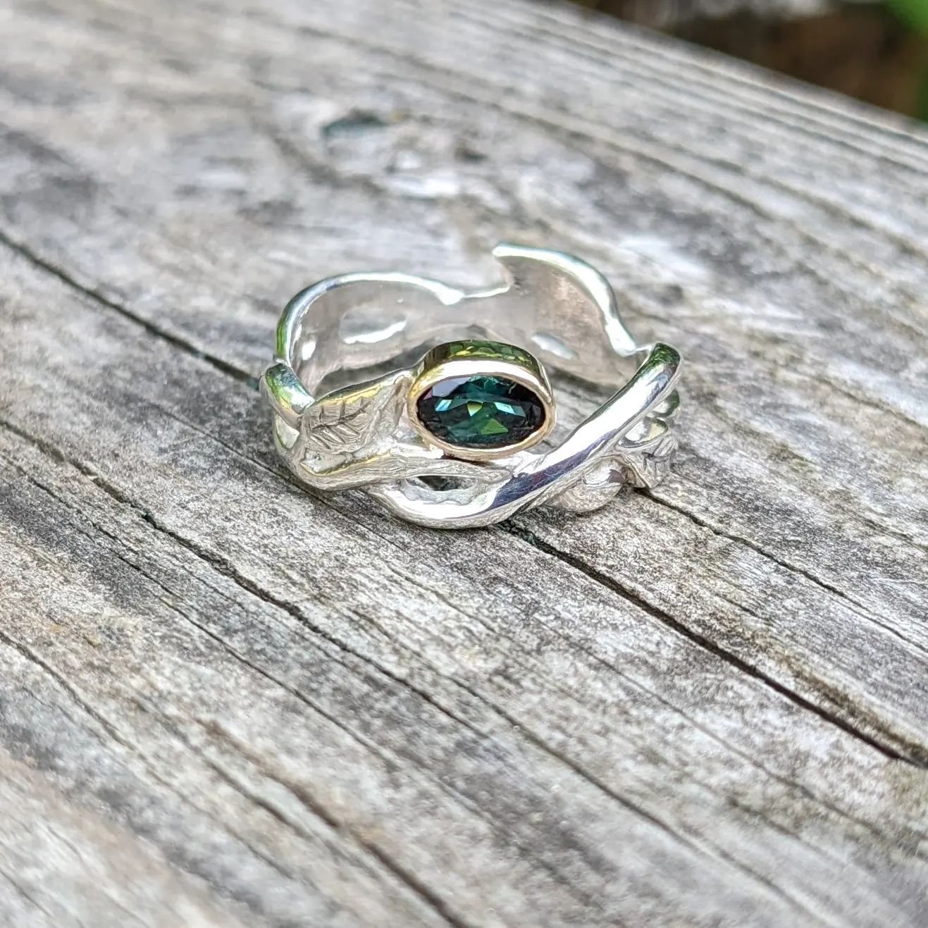 Check out this green tourmaline ring with gold and silver. I call this my secret garden ring because the story of the secret garden was one of the books that really kickstarted my love of the outdoors when I was young. 
It's a beautifully written boo