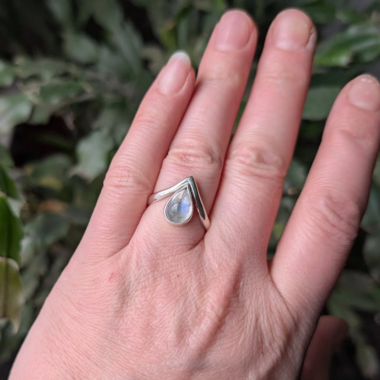 Finally finished this ring I've been thinking about for literal years. Rainbow moonstone and sterling silver in a size 7.5 Come see it in person at the @torontodarkartsmarket on February 7th for the perfect Valentine's treat! #customring #handmaderin