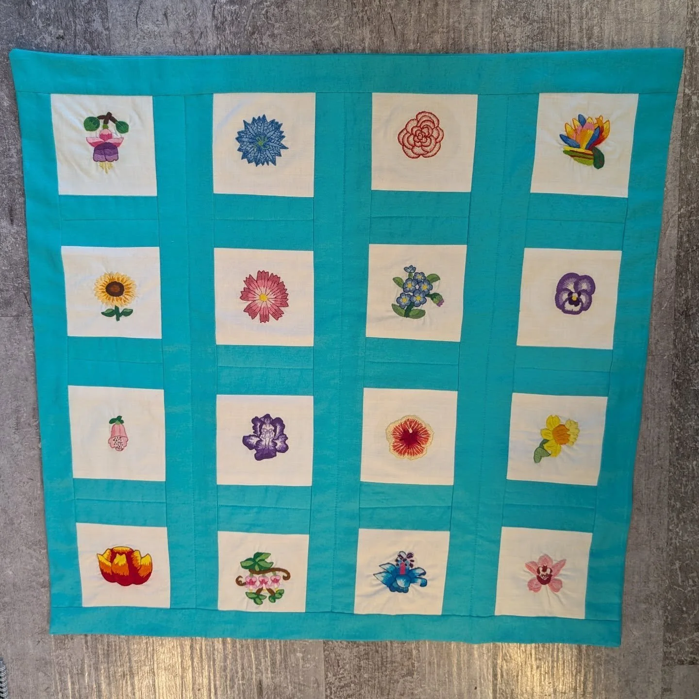 The embroidered quilt I made with @supergirl5172  is all assembled. Now I just need to attach suspension loops and it will be ready to hang!  This was a 4 year project and I am so proud of all the amazing work @supergirl5172 did on it. It's been a re