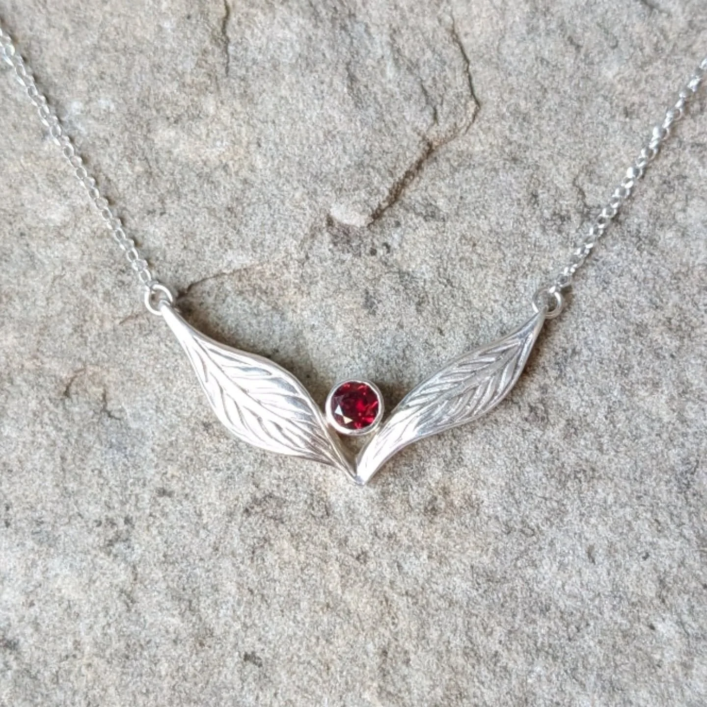 Calling all Toronto goths! Need something to do this Saturday? Come check out the @torontodarkartsmarket from 11- 5 at Ground Control in Parkdale . 
Very excited to show case this new version of my kyla leaf gemstone necklace, set with a vibrant garn