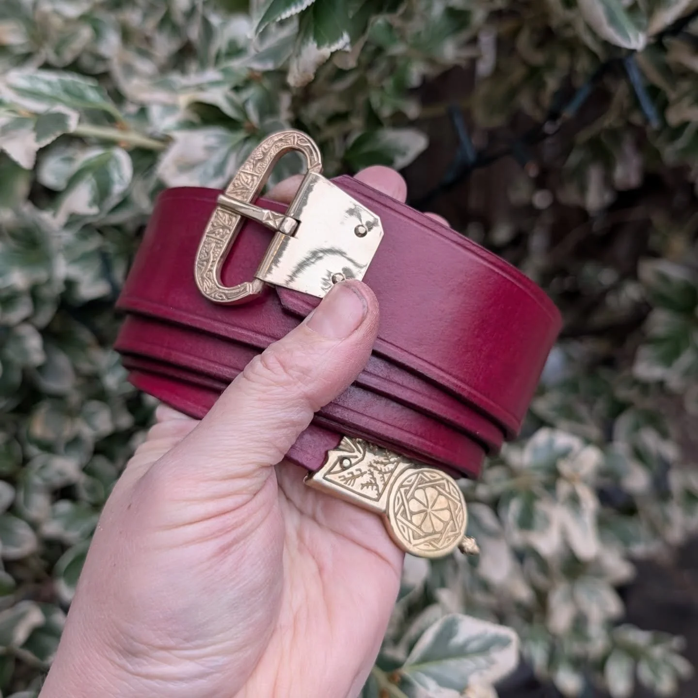 Extremely obsessed with the rich burgundy this belt came out. I dye each belt individually and every piece of leather responds differently. 
This one came out beautifully. This belt has reproduction fittings from a few different medieval finds. 
They