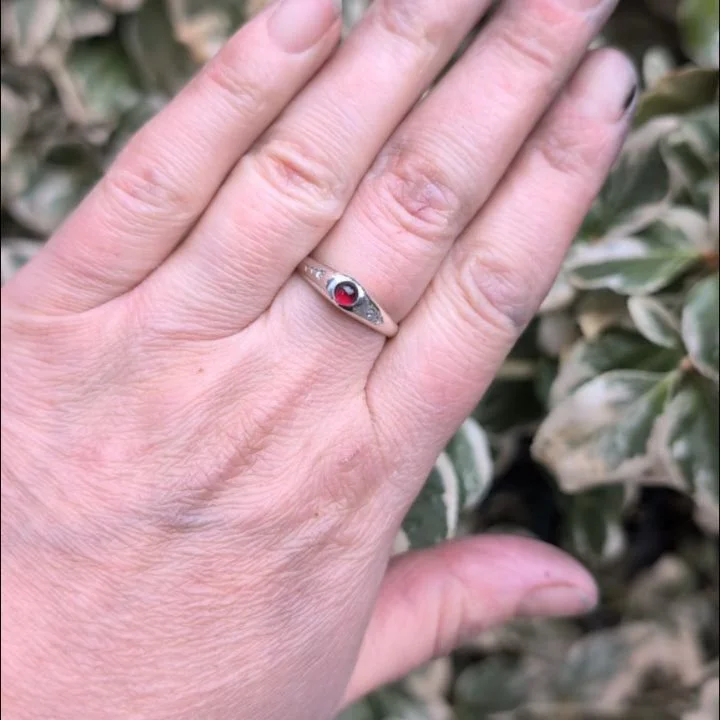 Stirrup rings! One with garnet and roses one with citrine and no roses. I love these rings because they are good for all genders, super comfortable and easy to wear. I have all manner of cabochon styles available like turquoise, lapis, peridot sapphi
