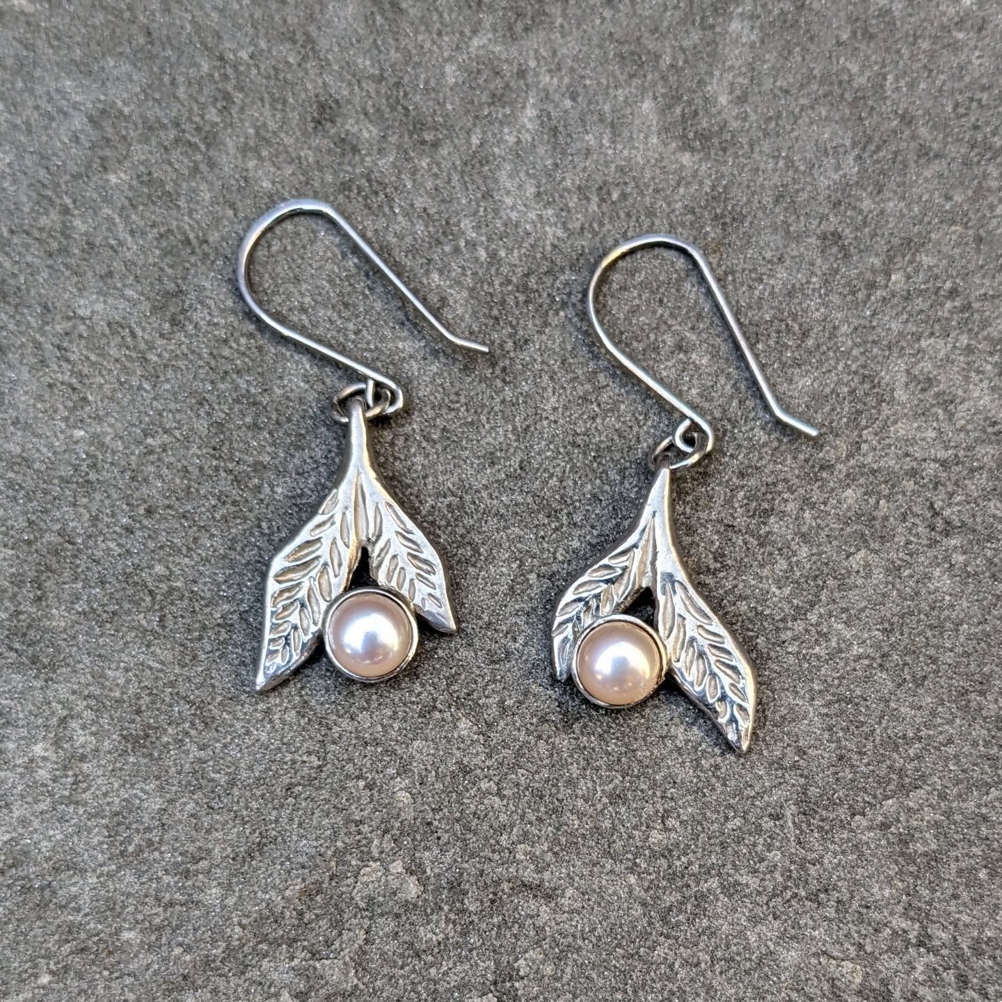 Something springy for you! Pink pearl leaf earrings in sterling silver.  They look cute and go with everything! 
#pearlearrings #springfashion #springlooks