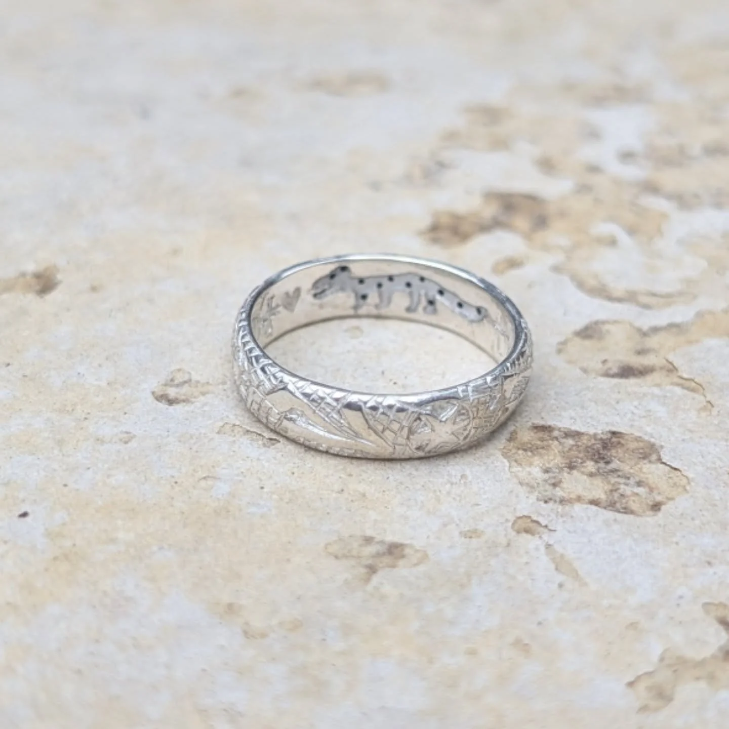 Very excited to be shipping off this reproduction ring with the tiniest enameled ermine on the inside! 
Had a great time doing the little tiny spots. You can see the original inspiration ring but the scale of that ring was quite a bit bigger so I had