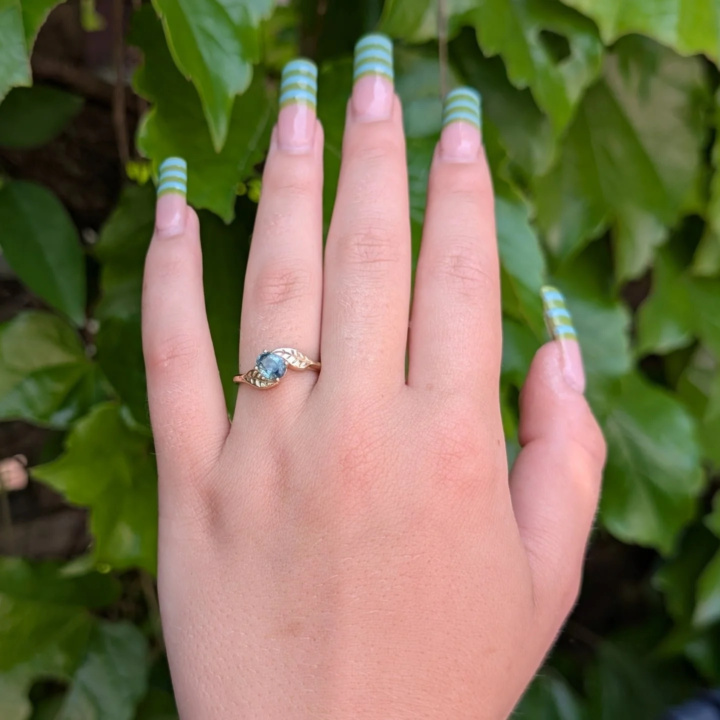 I'm going to be revealing a bunch of new rings at the beaches arts and crafts fair less than a week from today at the kew gardens. Like this one with an amazing sapphire set in gold. 
I'll be there from 10 to 6 Saturday and Sunday. 
There will be 150