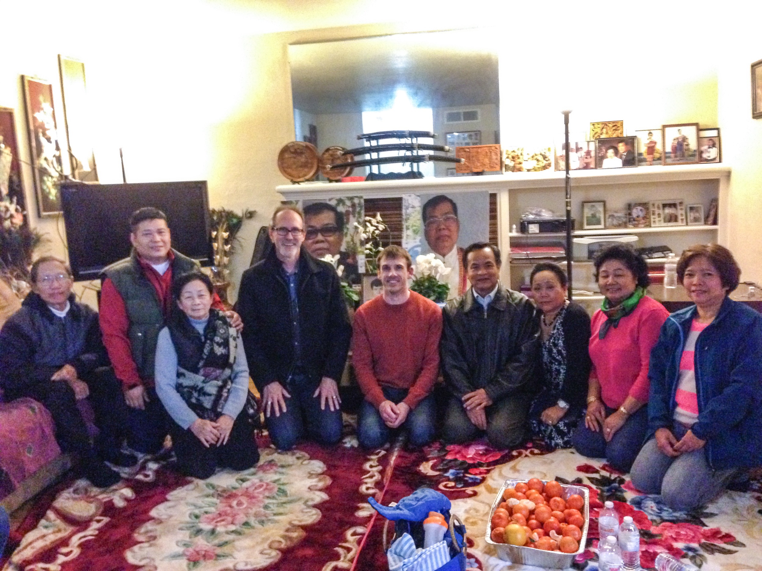 In this picture, I’m with the leaders of our Southeast Asian ministry at University Presbyterian Church: Elder Tony Bounthapanya and Pastors John and Lorna Bosavanh. Photos of Tony’s father are in the background. He died after an illness the day before. Laotian culture has a rich tradition of communal life that can sustain a grieving family. This is day one of three days of mourning. The home is full of people 24/7, cooking, chatting, praying, laughing, weeping.