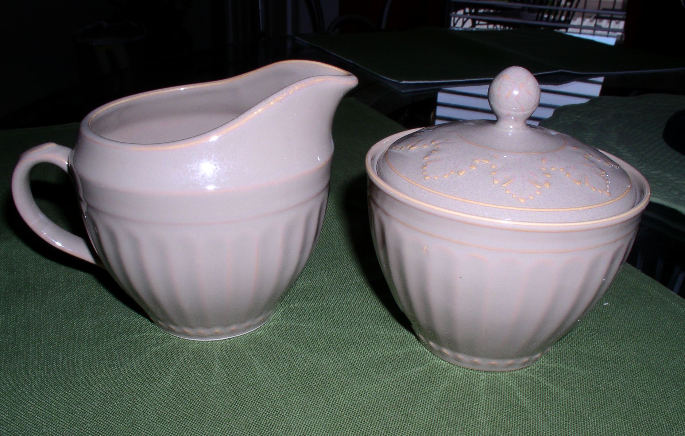 Creamer and Sugar set. A beautiful taupe color.