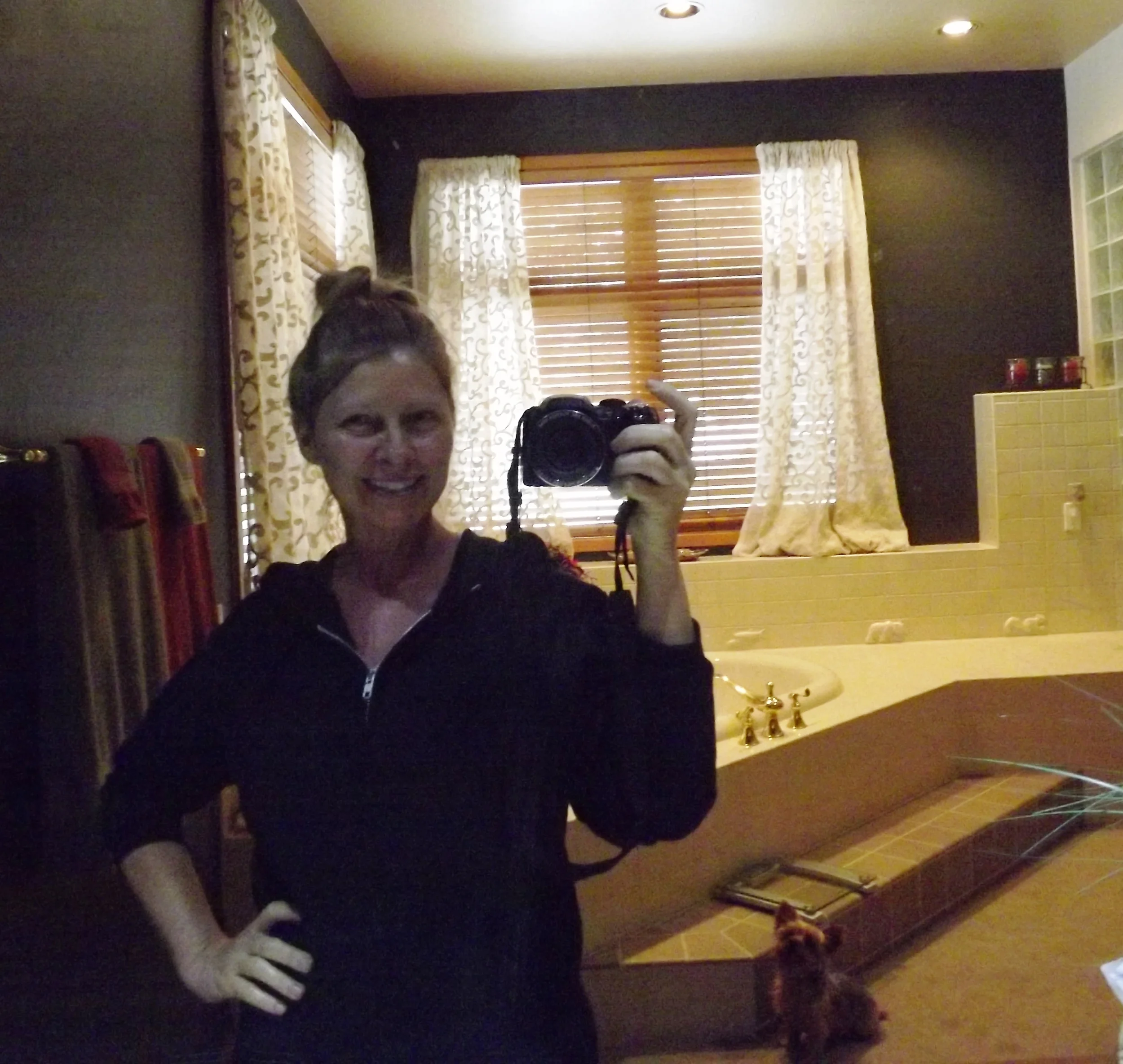 Here I am with it applied. I gently apply it to my face and neck and then remove with a warm washcloth. I feel so good when done! Notice Stella behind me. She is obsessed with coconut oil. Every time I have it out she is all about trying to get her nose in it. Such a sweetie!