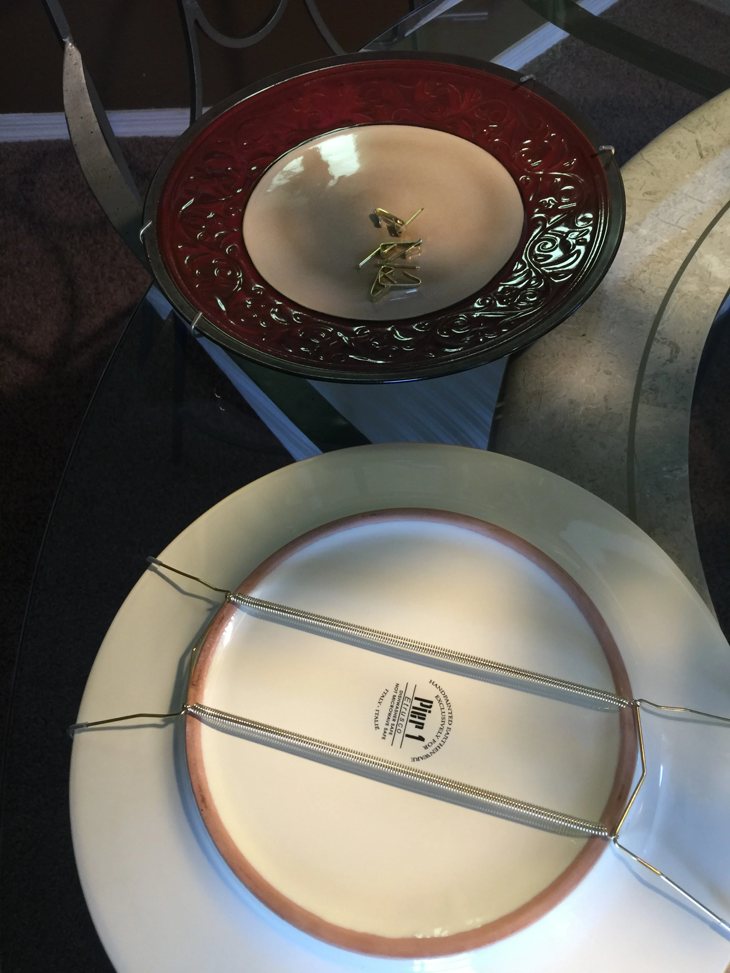Here is how the hangars attach to the plates and then I had little gold picture hooks to hang them on. 