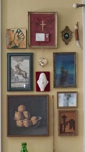 Lots of stuff, not enough wall? Hang it salon-style