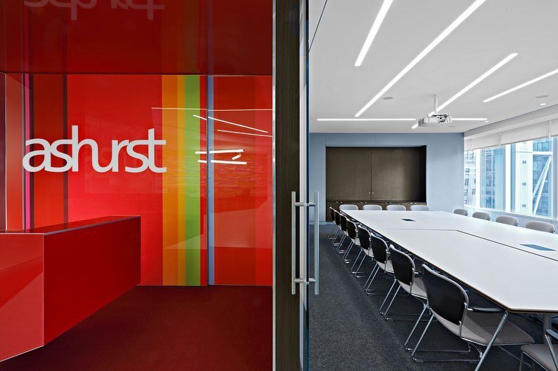 Slade Architecture designed
 the New York office of Ashurst, a leading international law firm, in Times Square. 

Their philosophy is to offer work spaces that simultaneously reflect the locale of the specific office as well as the Ashurst global bra