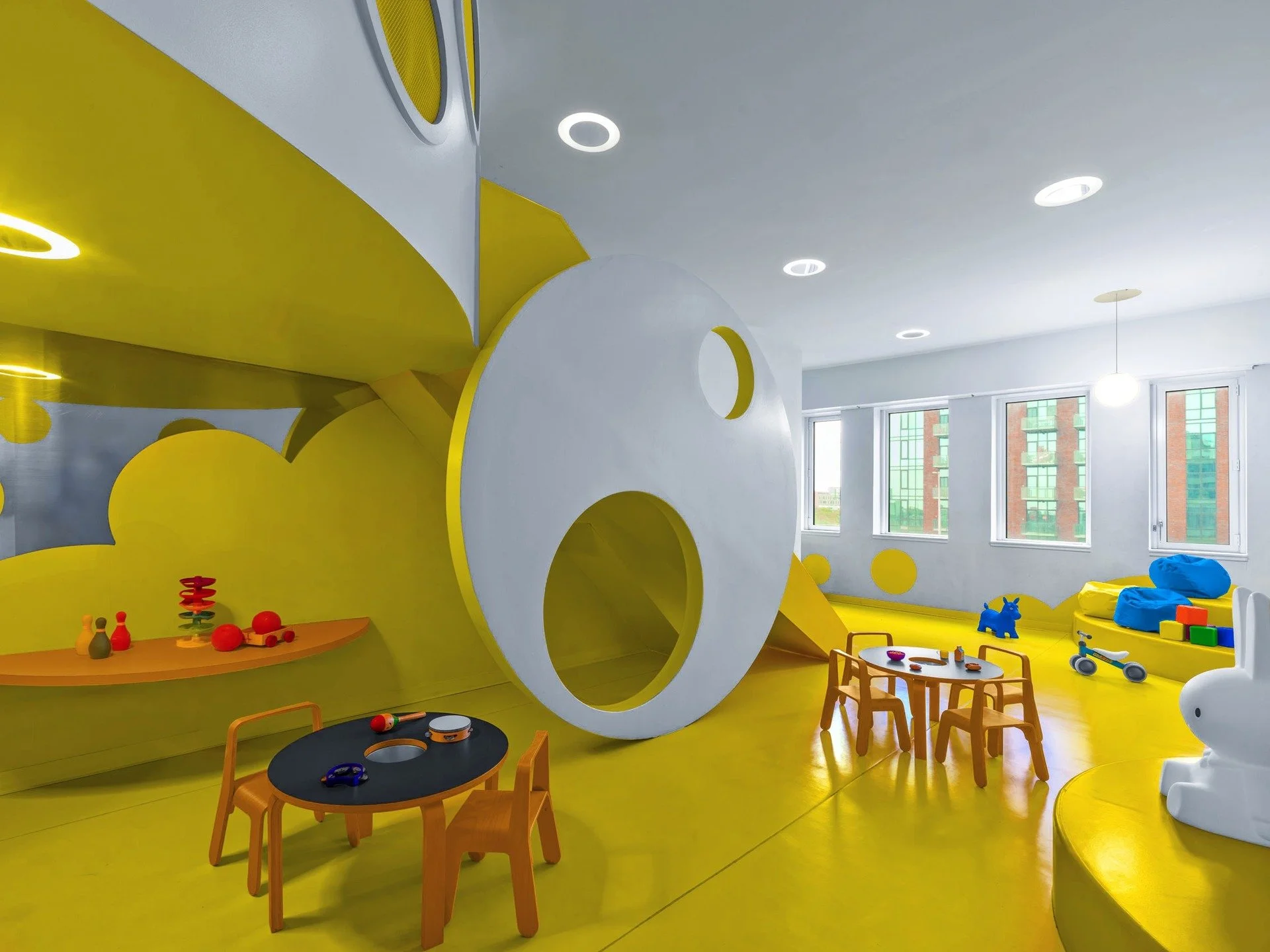The best play spaces don't tell a story&mdash;they suggest one. We design with just enough narrative to spark imagination, enough openness to invite invention, and enough movement to challenge every age. Color inspires, but never dictates. Let the ki