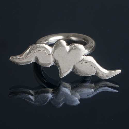 Silver heart and wings ring