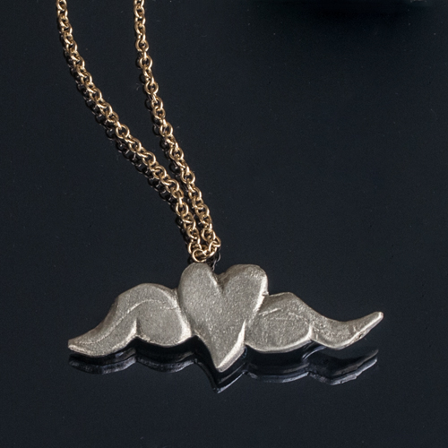 Gold necklace silver heart and wings