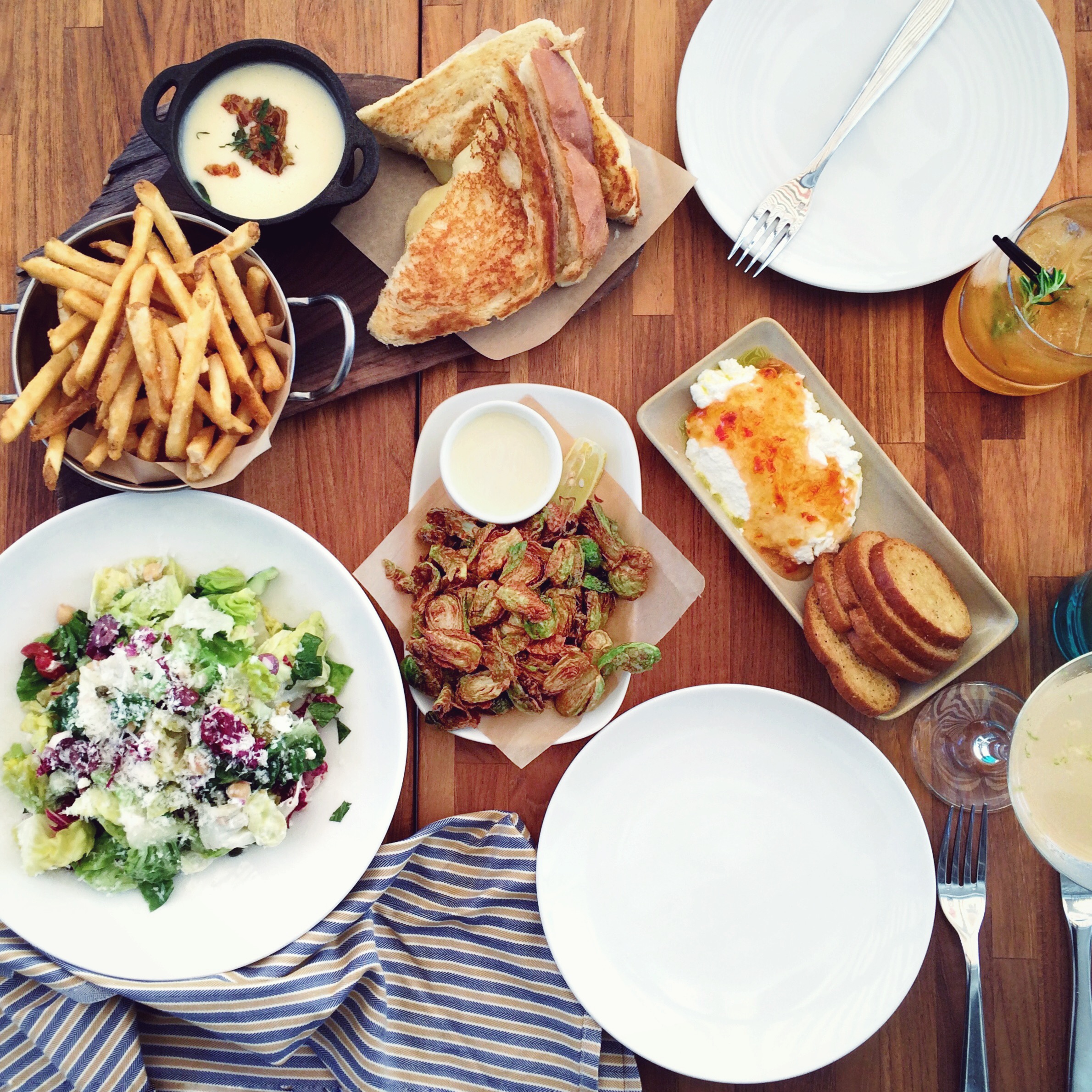 Being a vegetarian in the Napa Valley is easy with so many restaurants sourcing local + in-season produce…like Sam’s Social Club ! It’s in a cute little town called Calistoga that’s located just up-valley (as the locals say, but what it really means is “North”!) from Napa. Each time I stop by Sam’s, there are new, inventive veggie dishes to enjoy, and holy heck they have the best french fries in town! And also, let’s talk about fried brussels sprouts served with house made garlic aioli. If you’re into classic cocktails, this place is not to be missed — try “The Plunge” which is gin, St. Germain, lemon, verjus, and homemade grapefruit bitters.