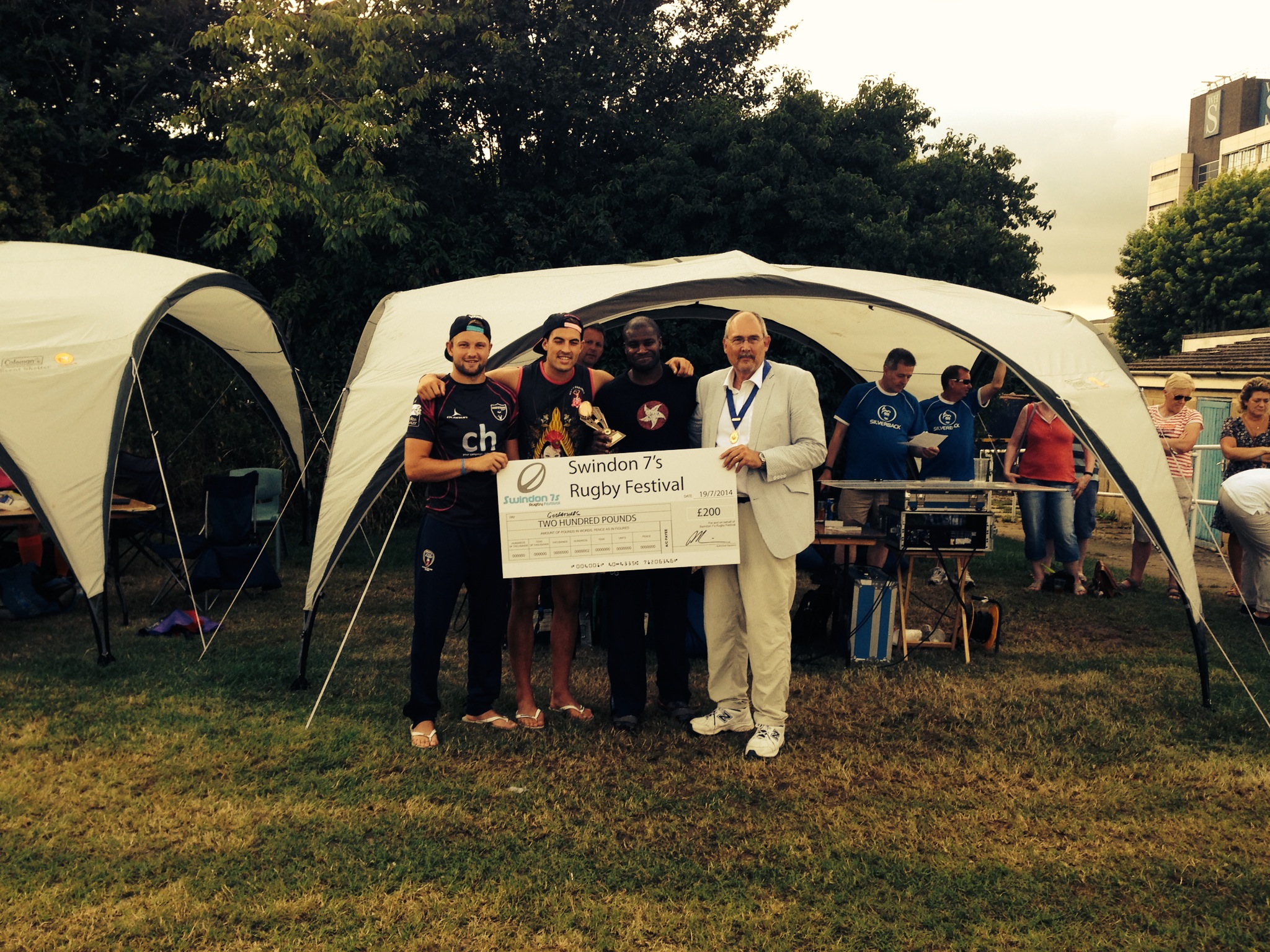 Chim , Matt and Cam collecting the cheque