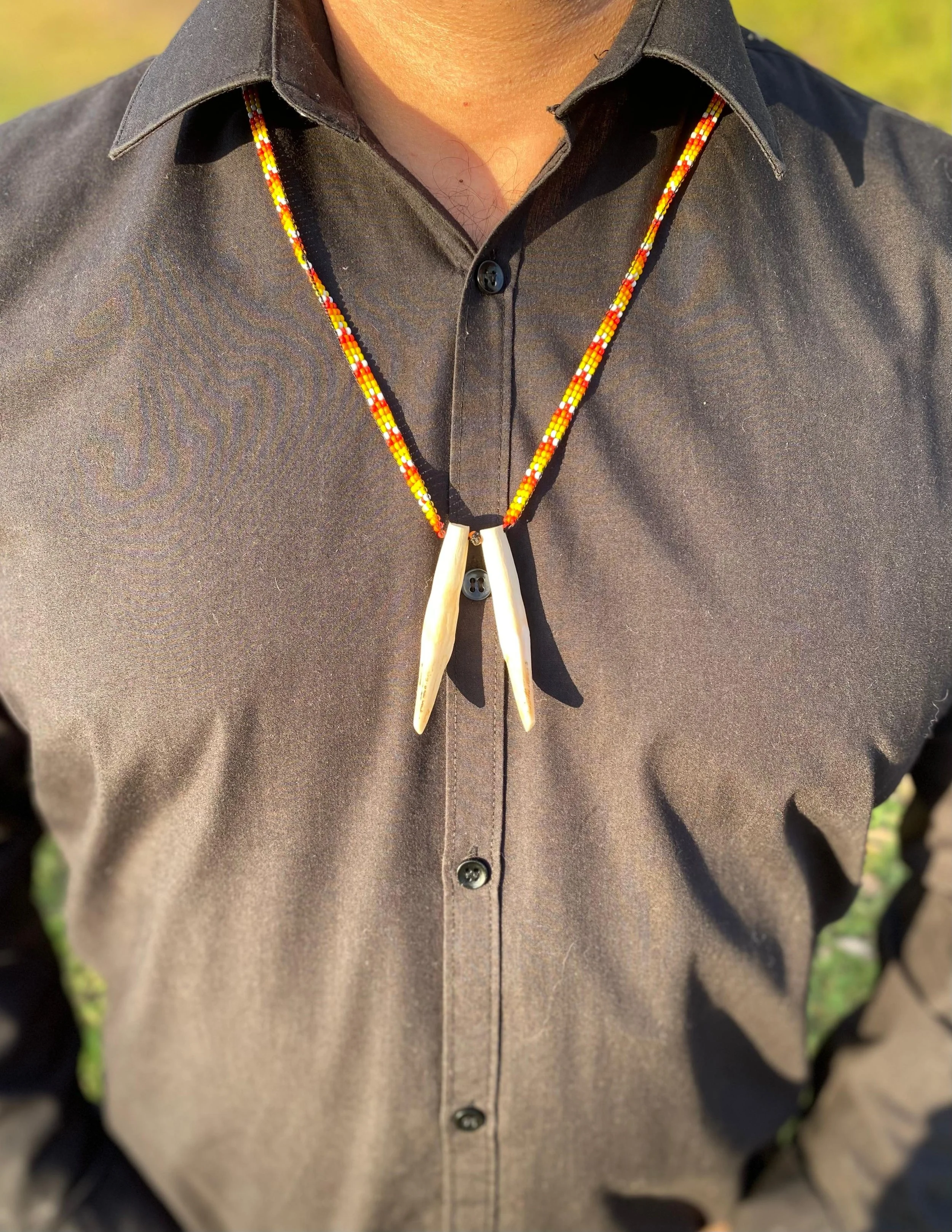 neckale double tooth £55.jpeg