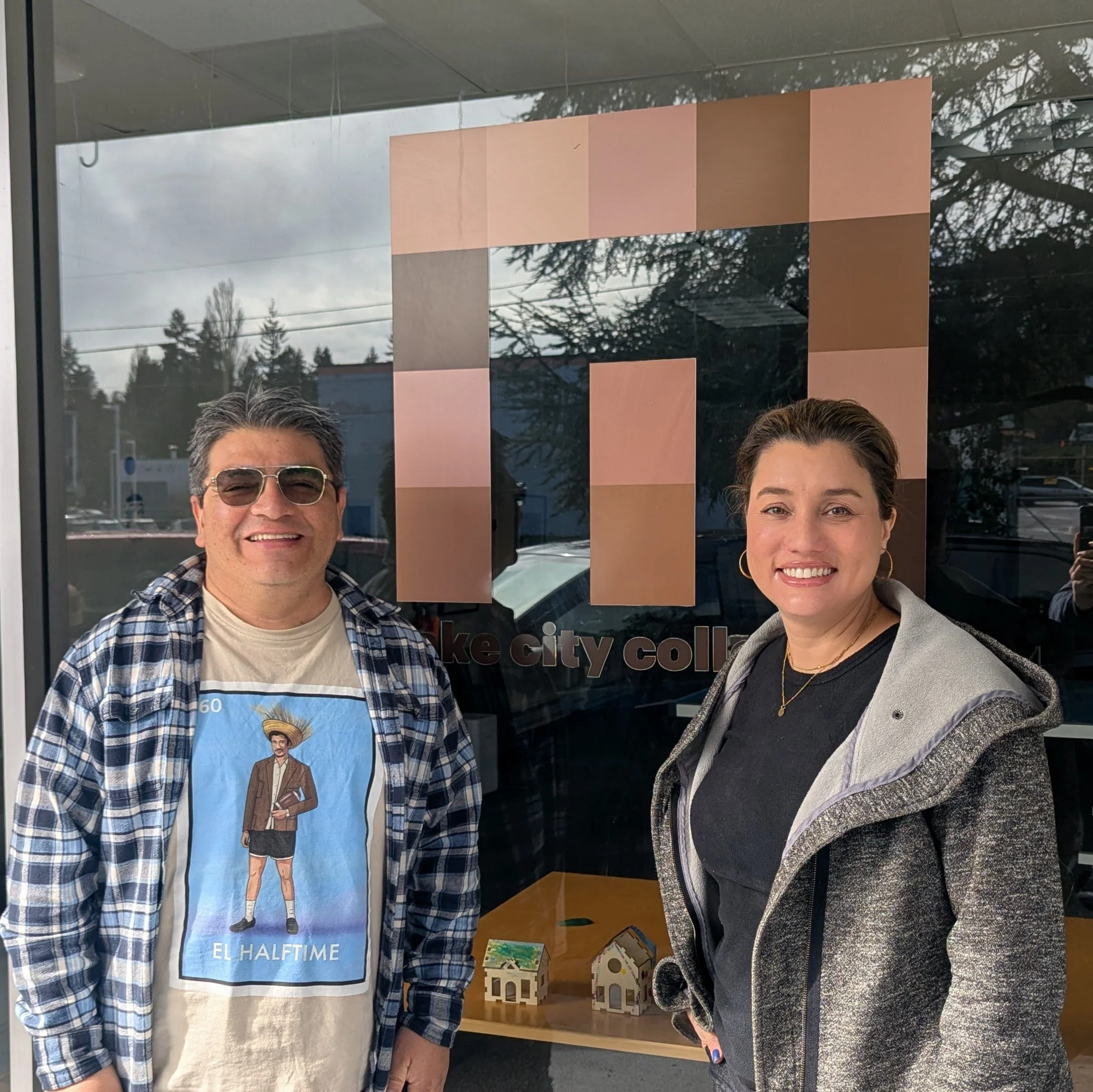 Seattle immigration attorney Lesley Irizarry-Hougan and Lake City Collective co-founder César García outside the Lake City Collective community center in North Seattle's Little Brook neighborhood.