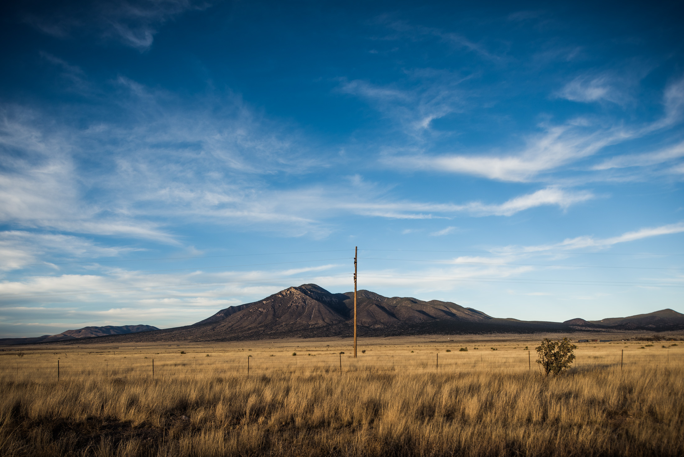  The Sierra Blanca peak overlooks the Tularosa Valley of New Mexico. In this valley, generations of my ancestors settled, were born, lived their lives and lie buried. 