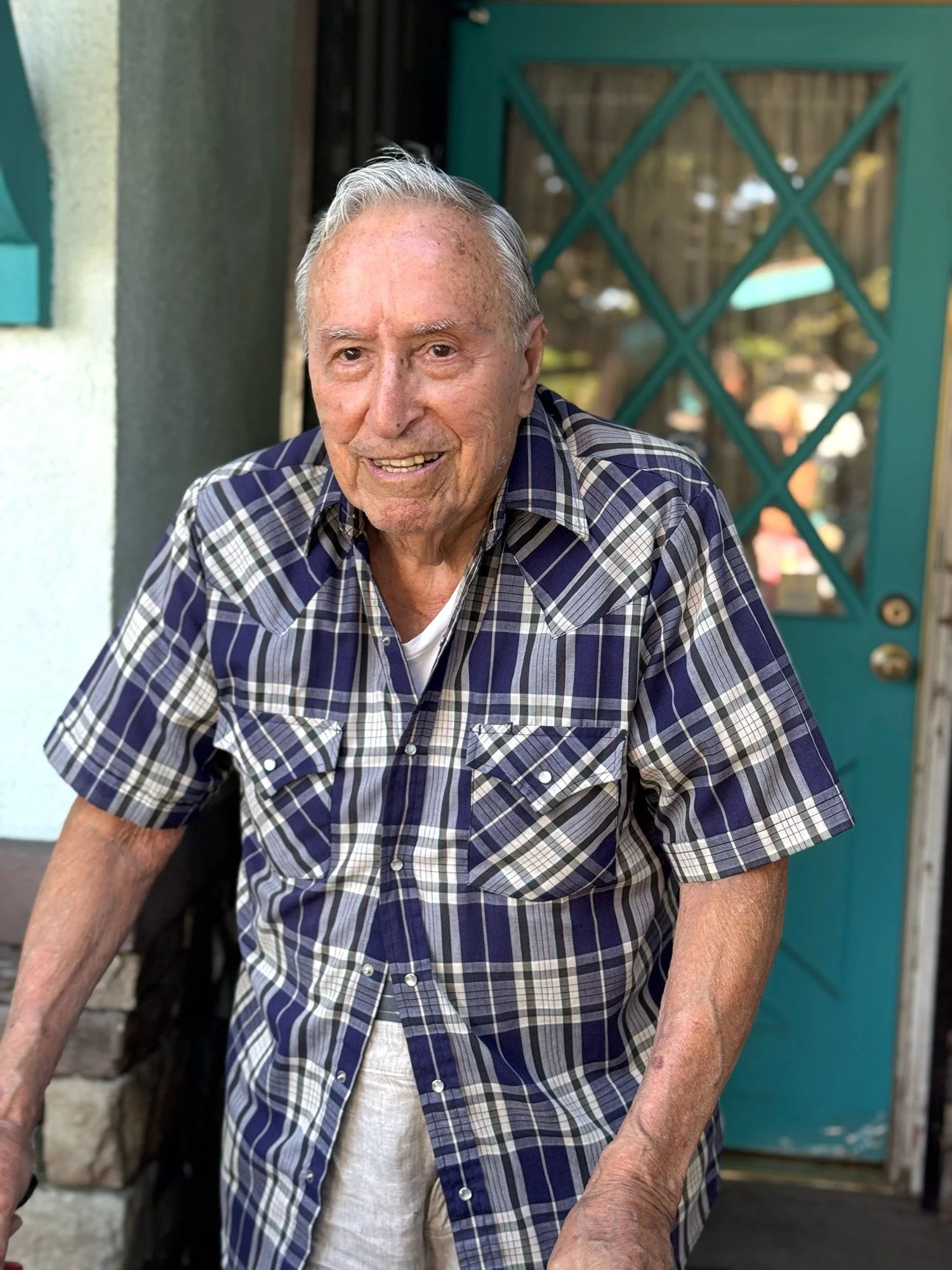 Dad in front of house.jpg