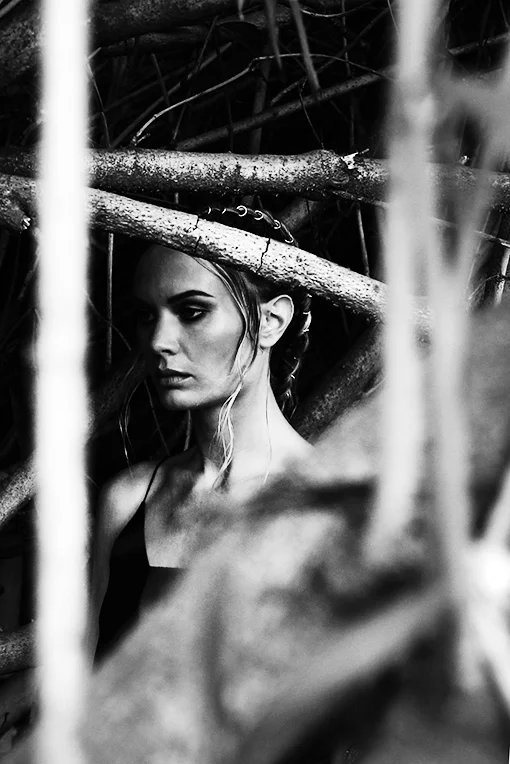 a mysterious being finds herself in the body of a foreign species. she stumbles around, examining her surroundings and adapting to her new form. what is her purpose here?