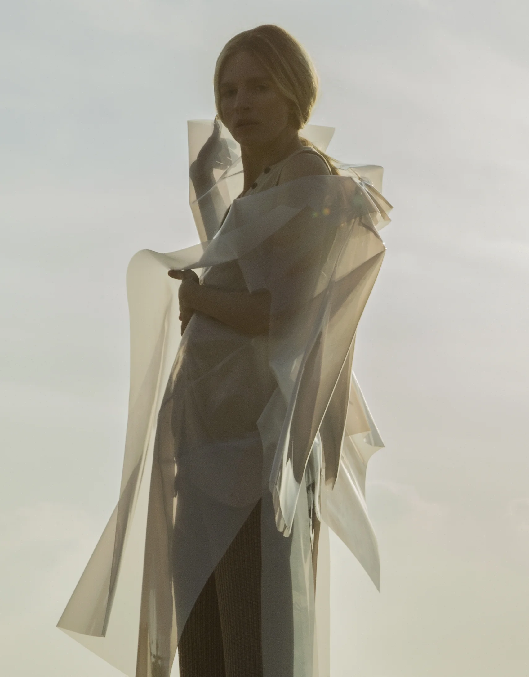 coat Melitta Baumiester , ribbed knit tank top Lavish Alice , ribbed knit pants Designer Remix