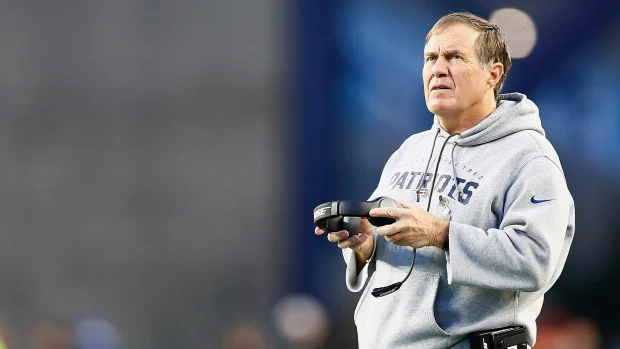 Bill Belichick probably watching a TV in the parking lot with his bionic eyes.