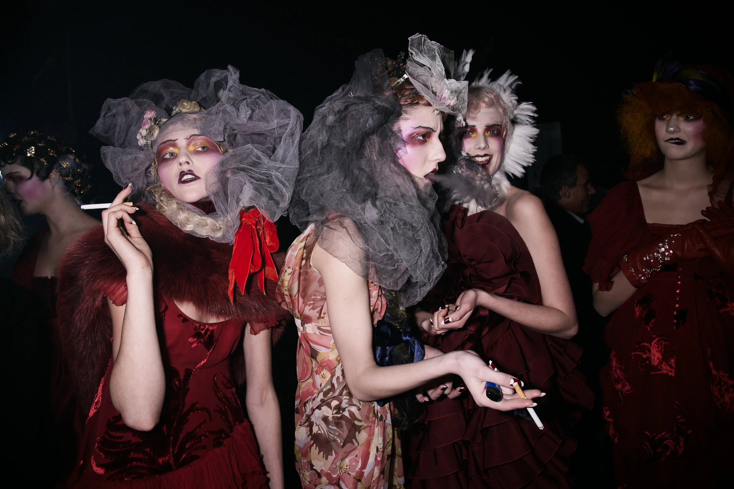 Smoking backstage at John Galliano