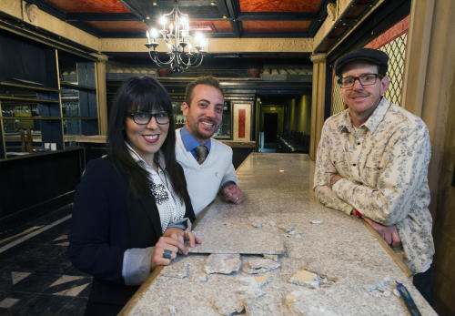 Toni and Tony Calderone, left, with their executive chef Scott Robinson inside the former Colosseo building in the 100 block of North George Street. The group plans to open Tutoni's in the space in April. They are demolishing the first-floor bar to make more space for dining. (DAILY RECORD/SUNDAY NEWS -- Paul Kuehnel)