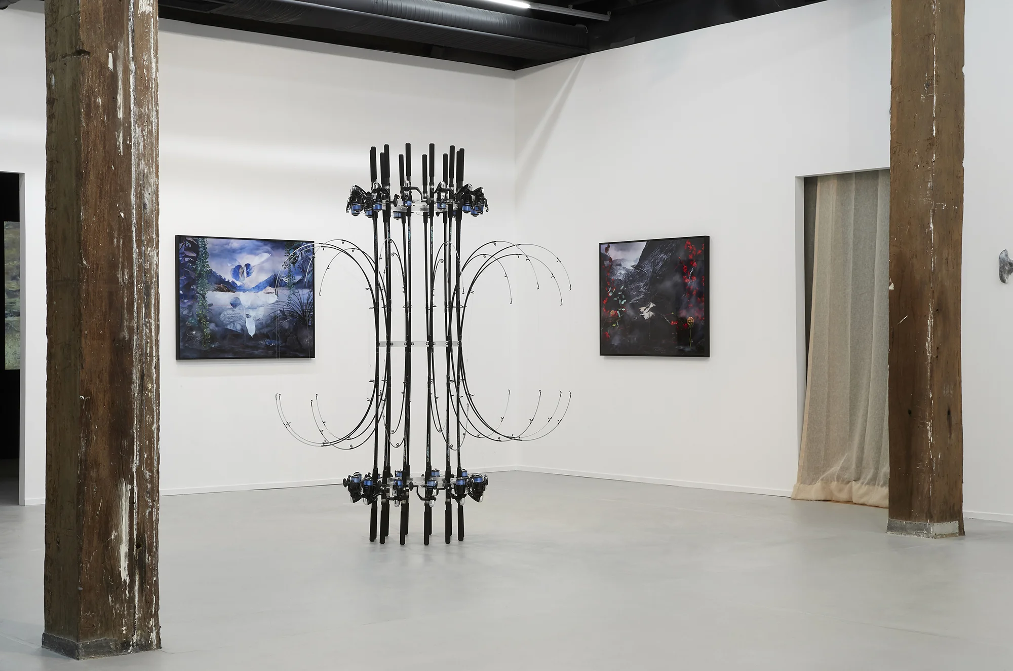 Left to right: Kai Wasikowski, 'Realtree #1,' 2017, inkjet print, 90 x 115 cm. Kai Wasikowski, 'In-tension #2,’ 2018, fishing rods and line, 210 x 200 x 200 cm. Kai Wasikowski, 'Realtree #2,' 2017, inkjet print, 90 x 115 cm. Installation view 2018 NSW Visual Arts Emerging Fellowship , Artspace, Sydney. Image credit: Zan Wimberley.