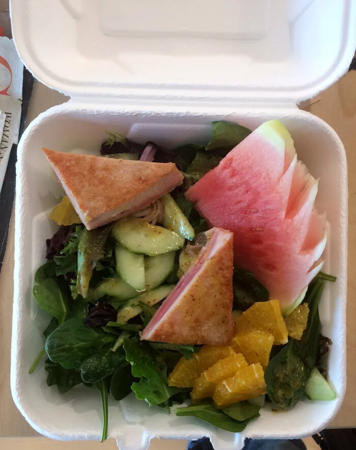 This was lunch the other day - seared tuna on a bed of spinach and greens, accompanied by artistically carved watermelon. I was over the moon.