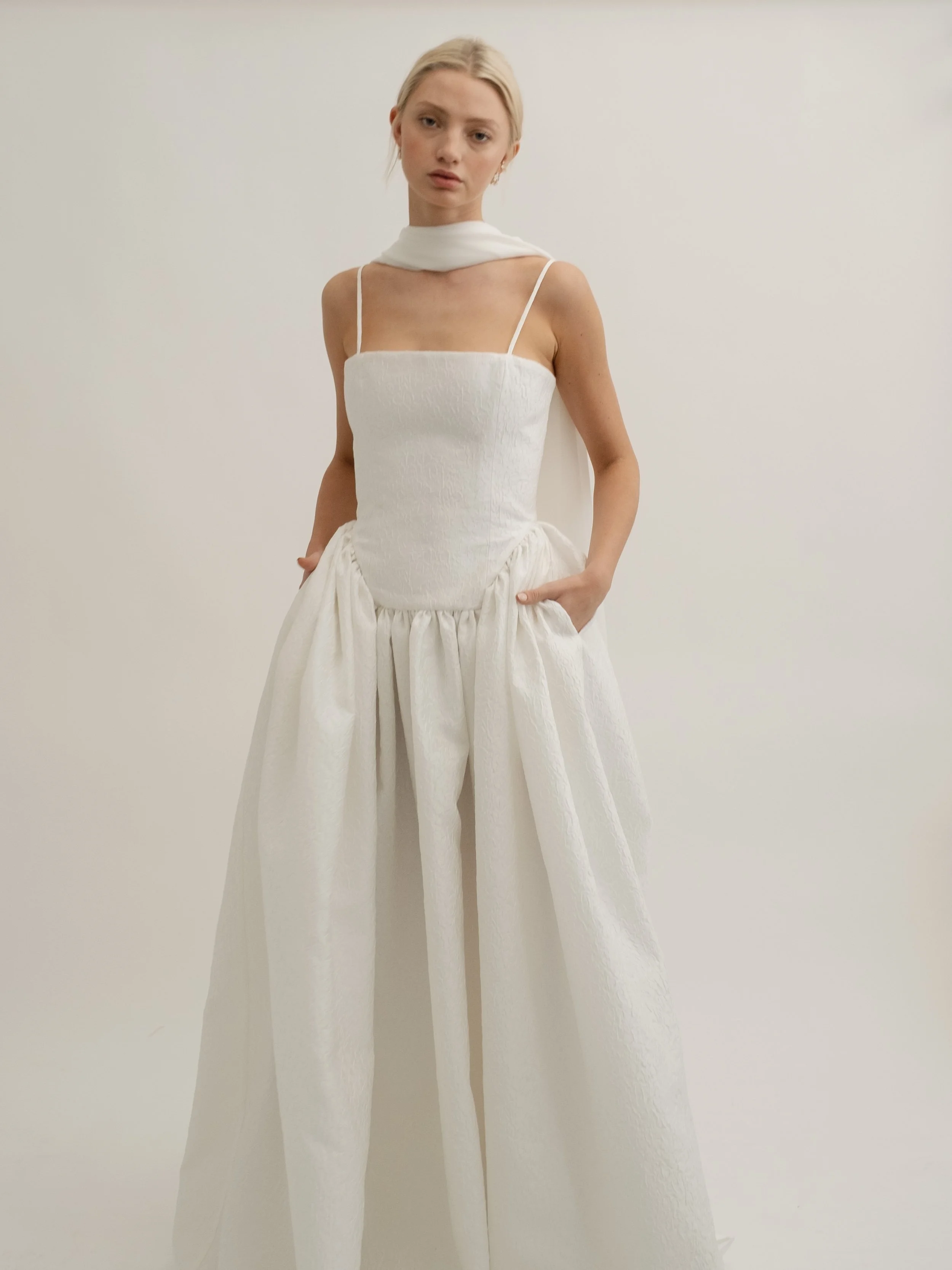 Delphine wedding dress by Jessica Bennett brocade structured dropped waist bodice with full length skirt and train crafted from a luxurious brocade fabric 