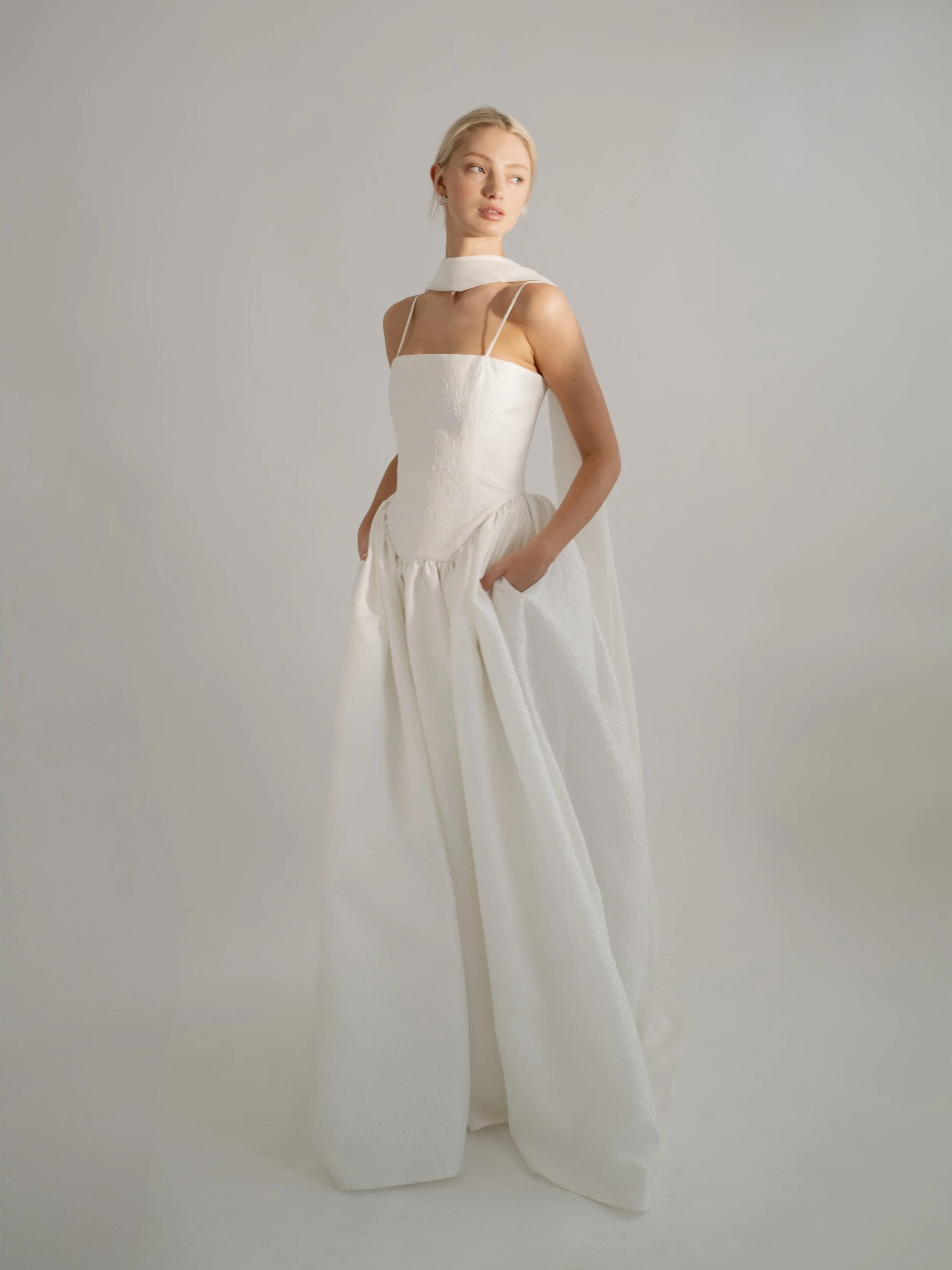 Delphine wedding dress by Jessica Bennett brocade structured dropped waist bodice with full length skirt and train crafted from a luxurious brocade fabric 