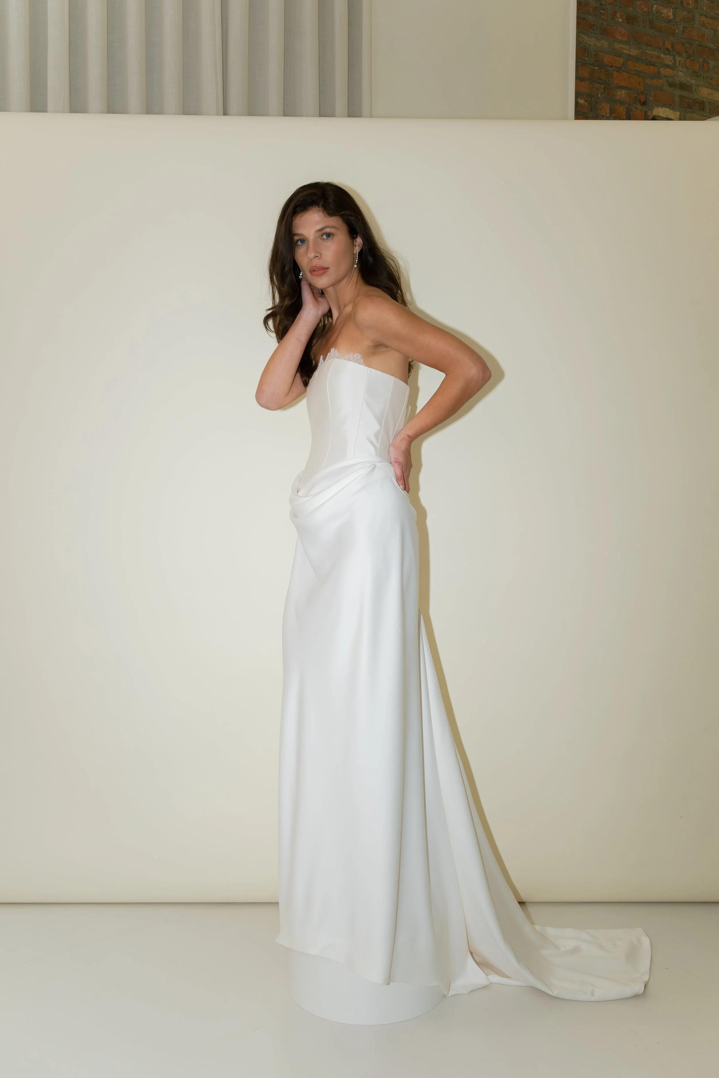 Tali dress by Jessica Bennett corset bodice with draped bias cut satin skirt and lace trim modern romantic bridal look