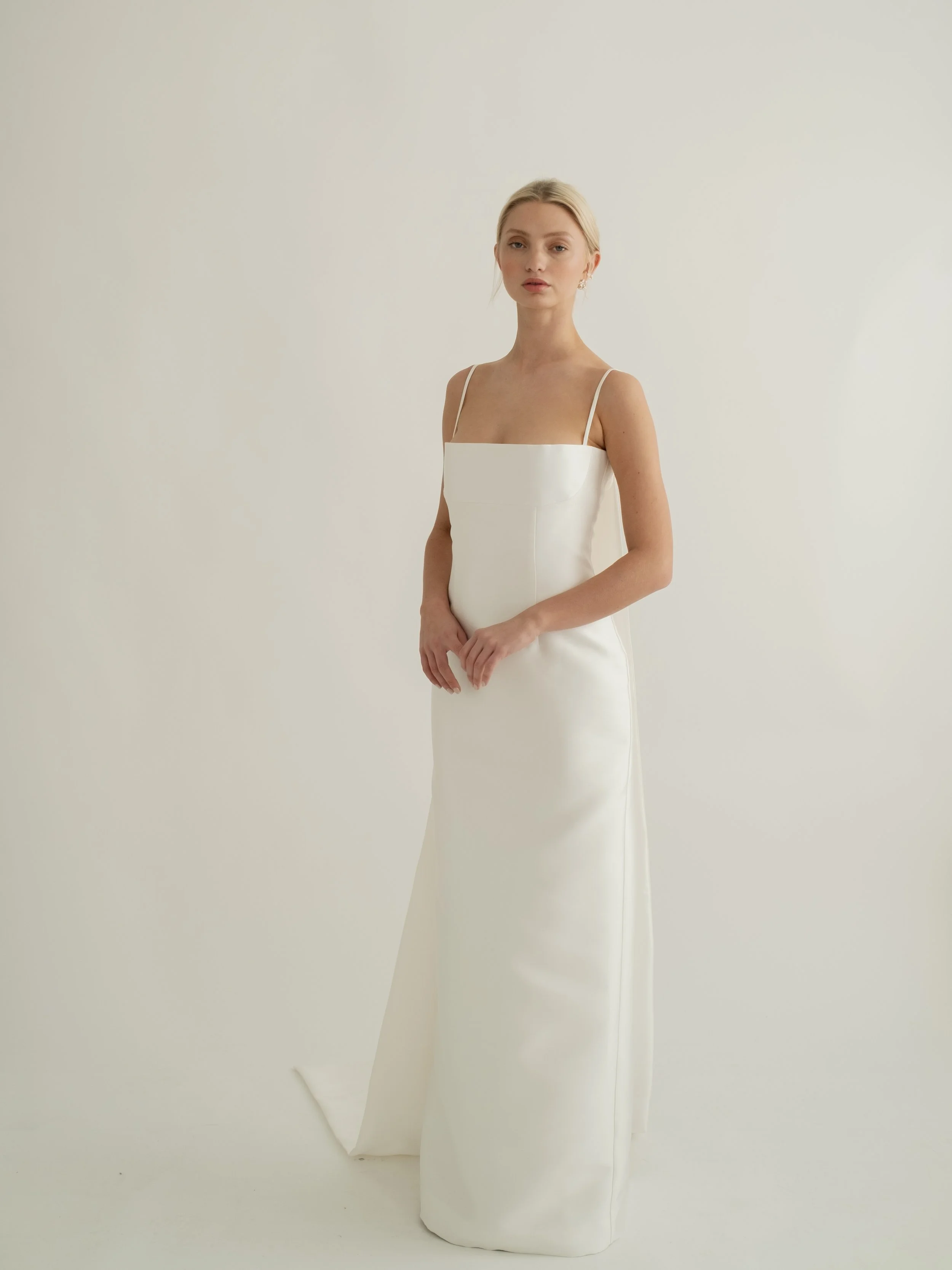 A Minimalistic removable train that pairs with our Wren dress and fastens to the inside of the dress bodice.
