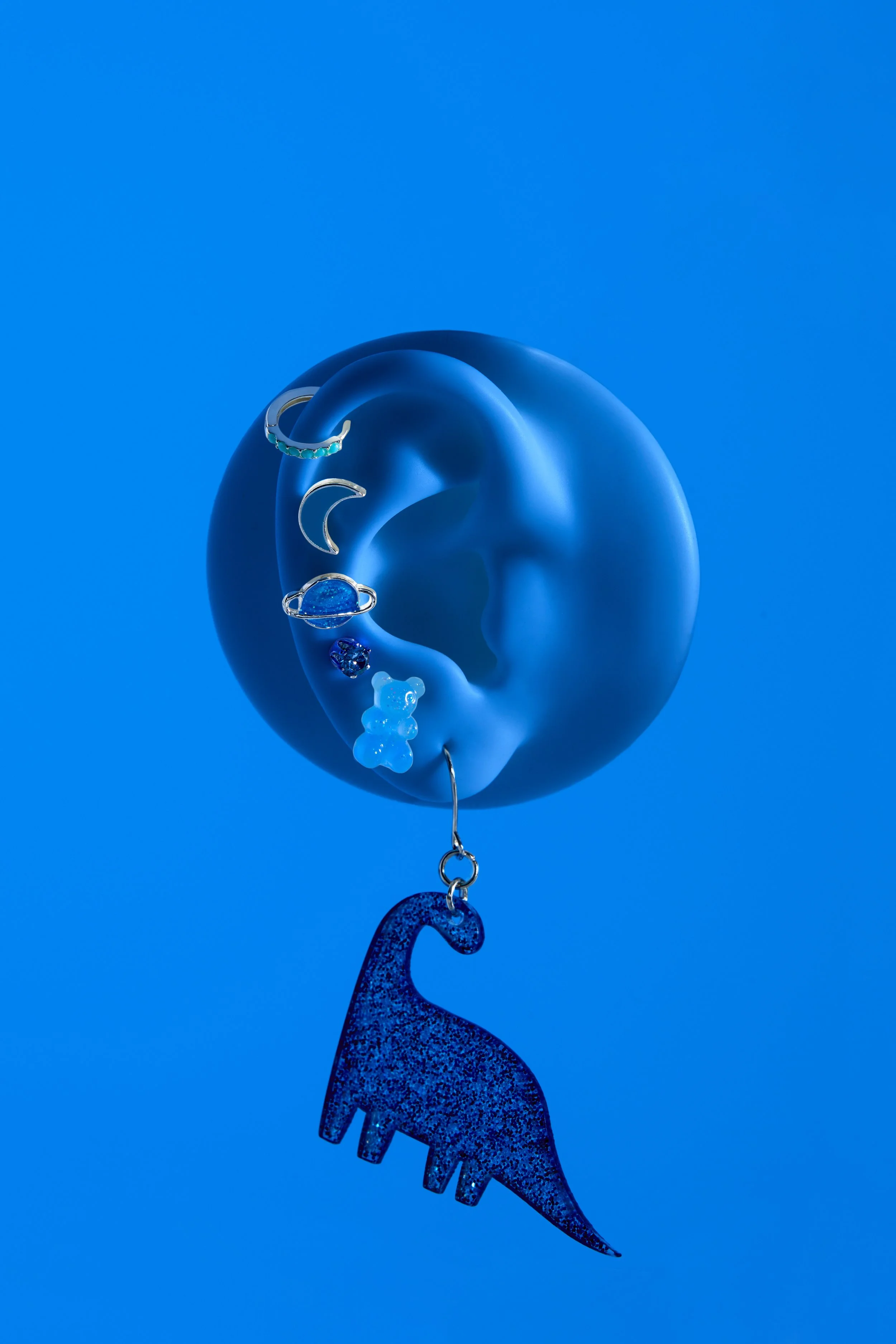 2023_CL_EarPrint_PrideFlatlay_Bay-5_Blue_rt.jpg