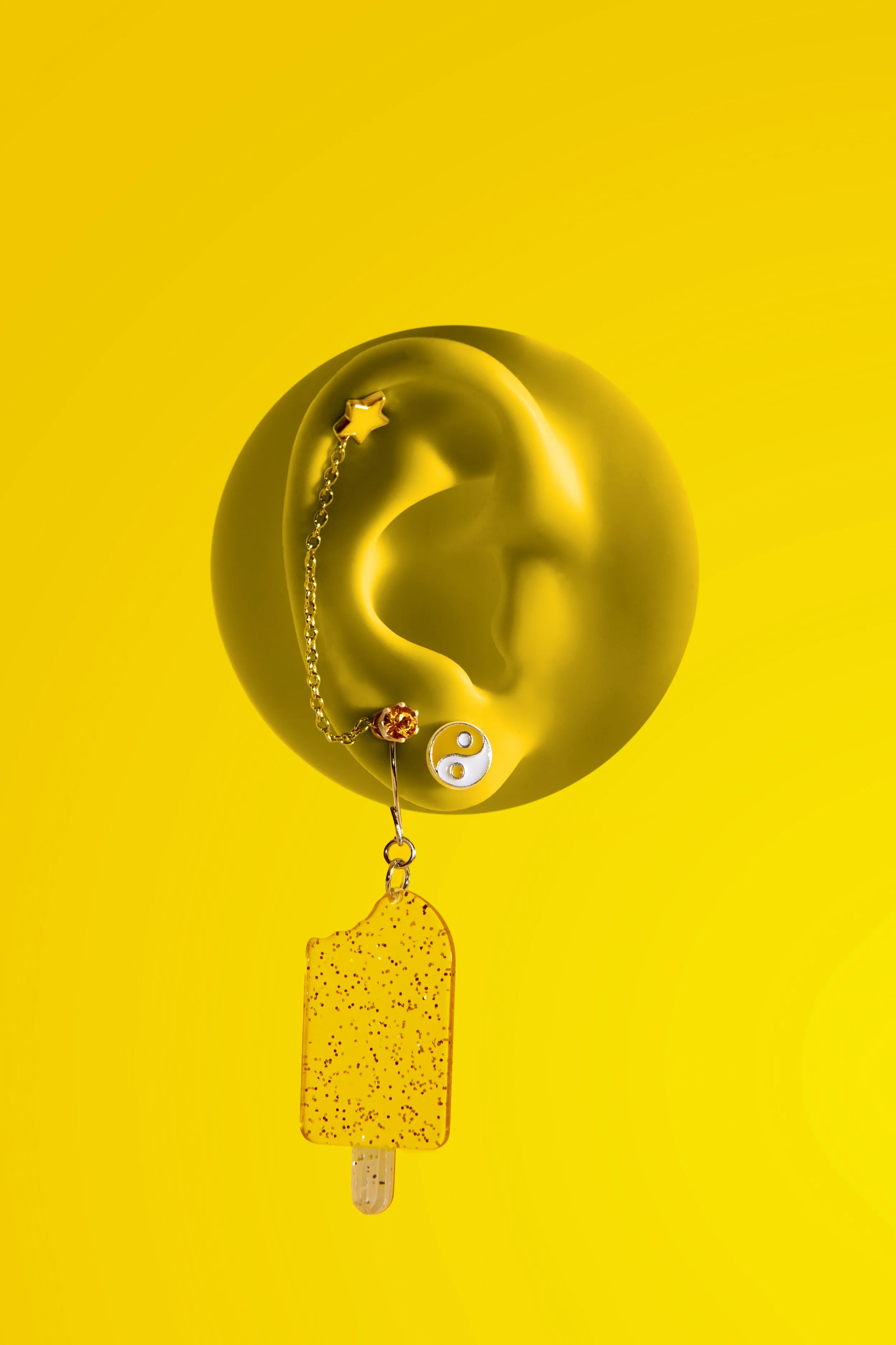 2023_CL_EarPrint_PrideFlatlay_Bay-5_Yellow_rt.jpg