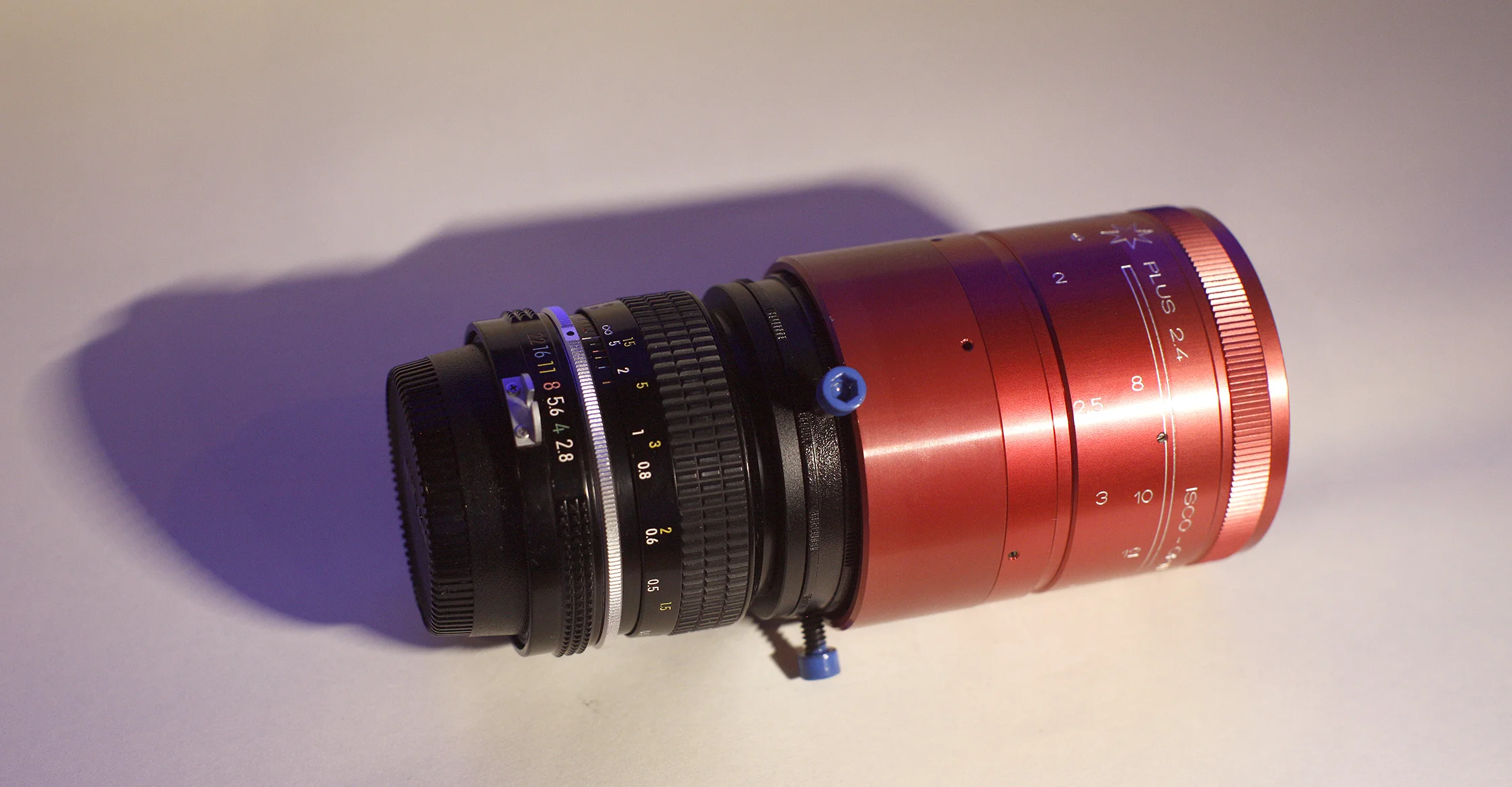 RED WITH NIKON SLR LENS.jpg