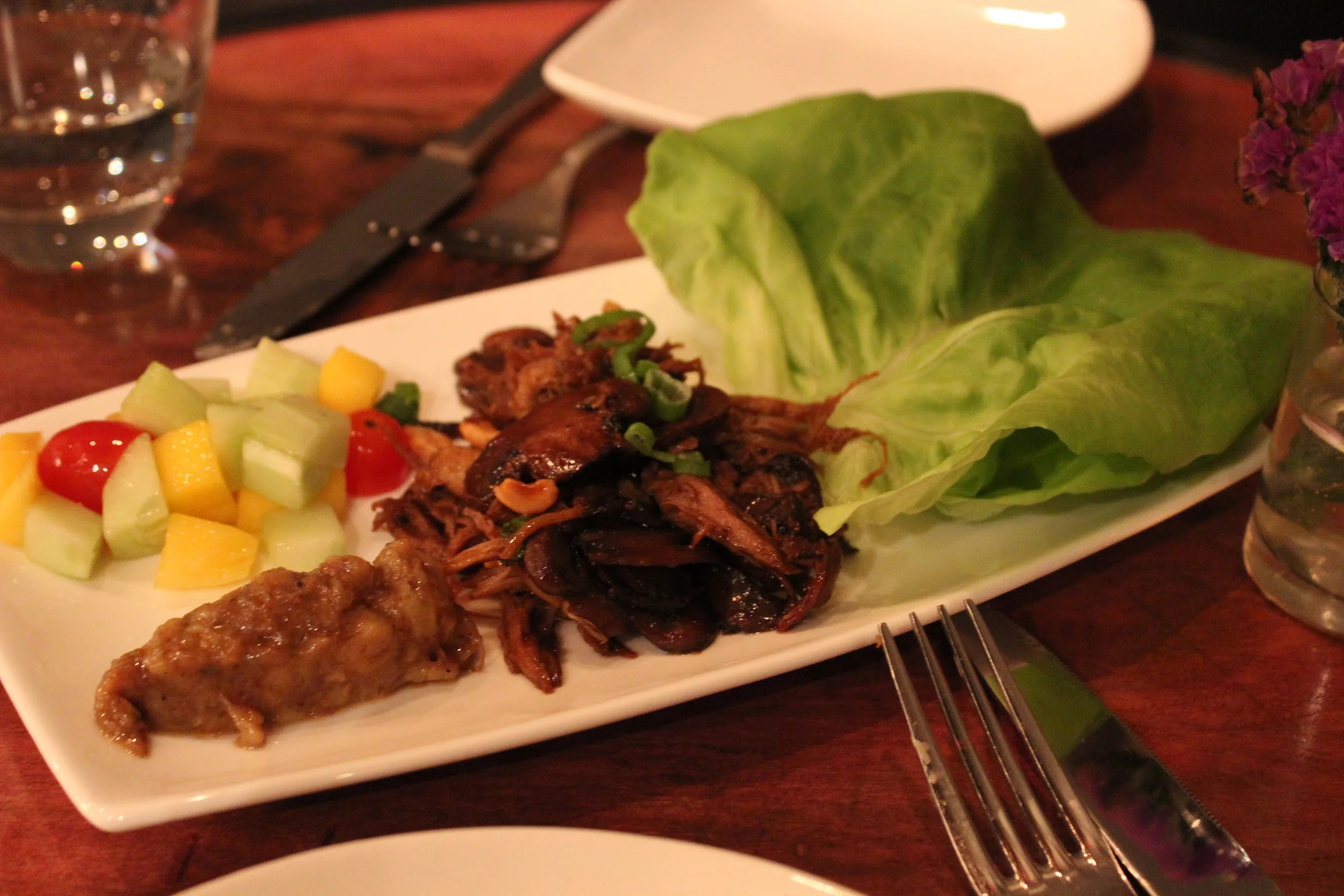 Course 4: Braised Duck Lettuce Wraps, Mushrooms, Picadillo, Raisins, Peanuts, Roasted Banana
