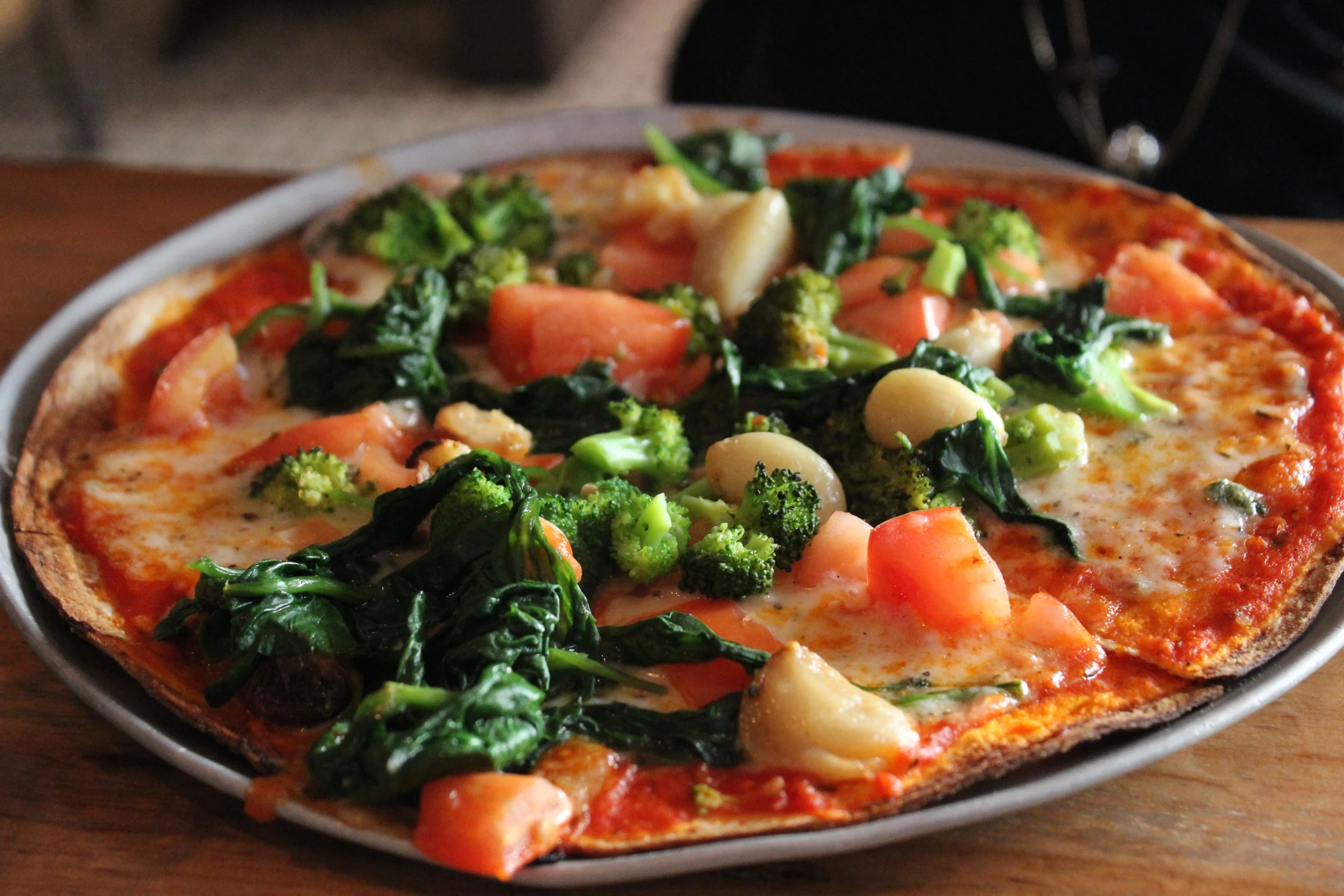 Guardino - Marinara Sauce & Cheese, Broccoli, Fresh Tomatoes, Sweet Red Onions (kept those off), Roasted Garlic, Spinach
