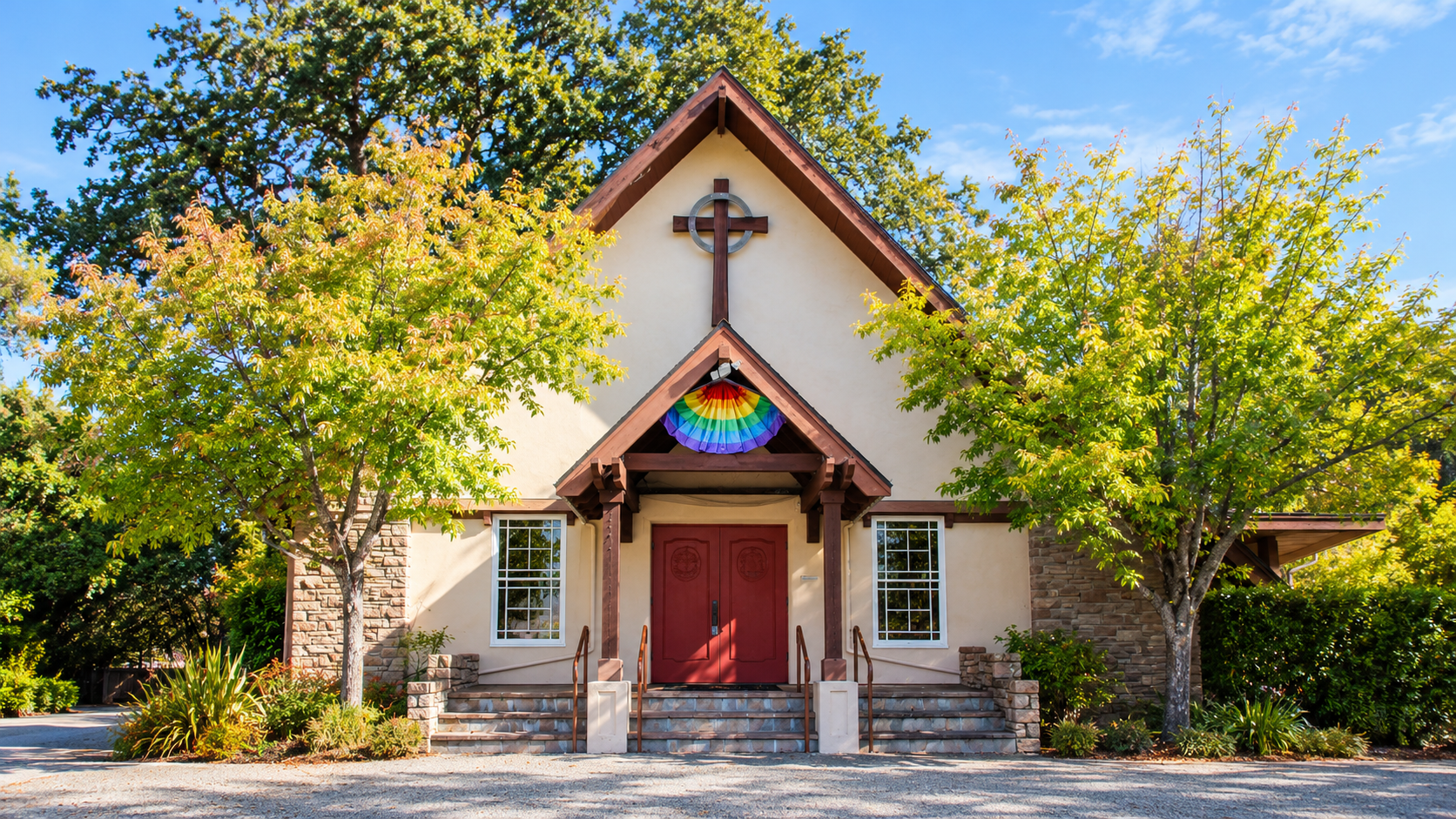 Sunlit Storybook Church with Rainbow Banner.png